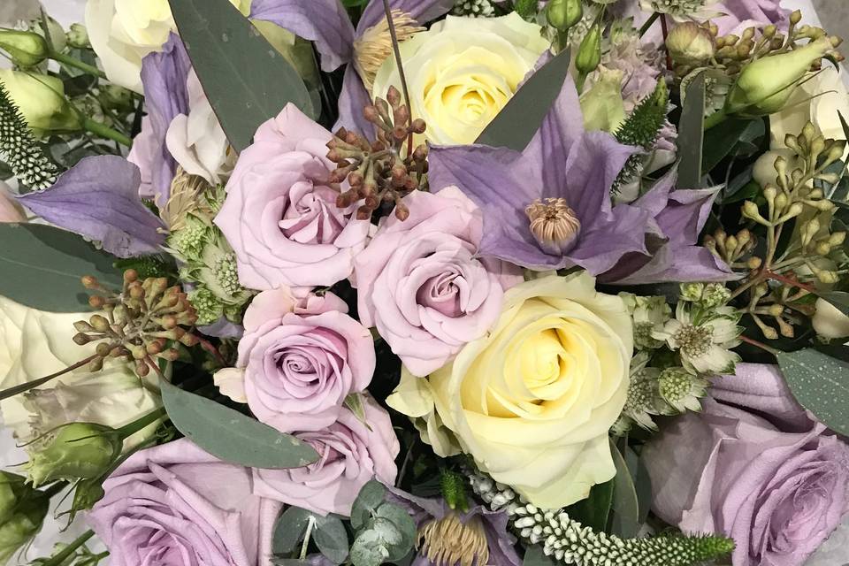 Bouquet of clematis and roses