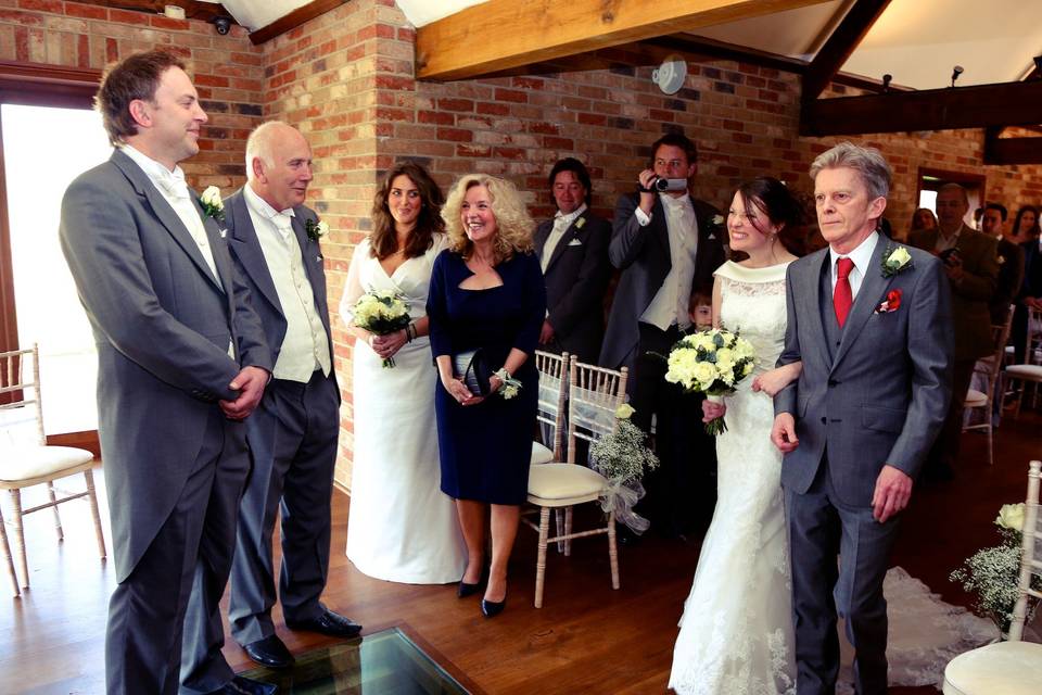 Bride and dad walking isle