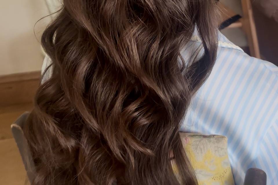 Half up flipped pony