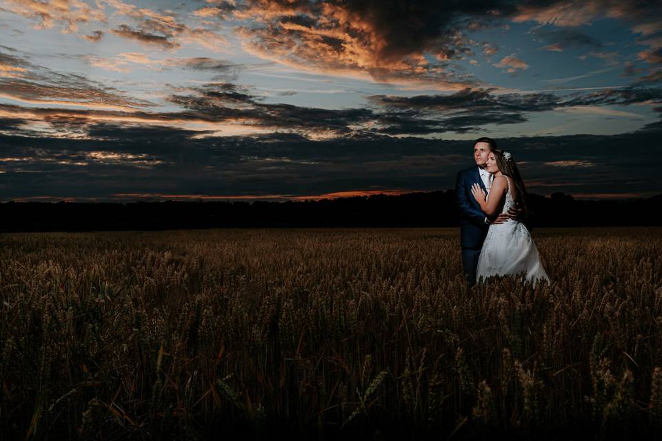 Bride and groom at sunset