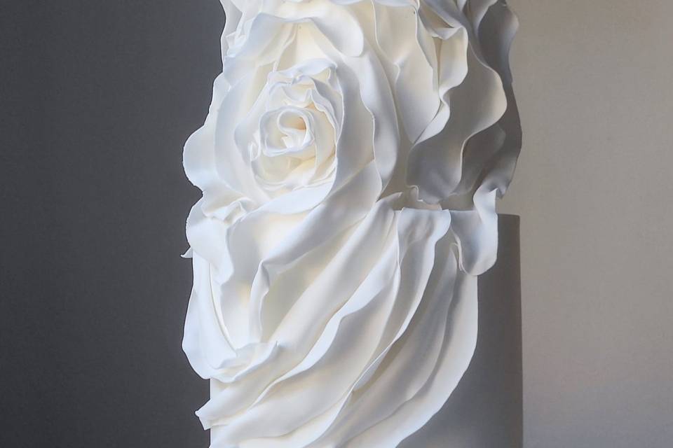 White ruffle modern cake