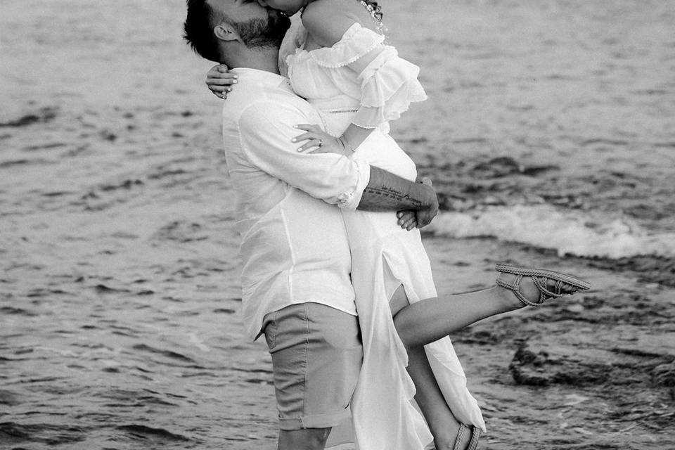 A romantic moment by the sea