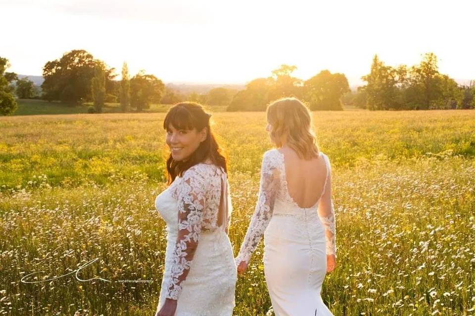 Happy Brides in the Meadow