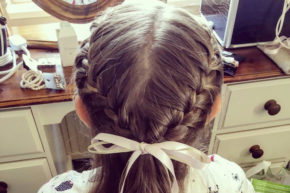 Flower girl plaits with ribbon