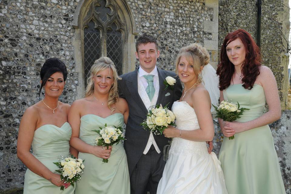 Bridesmaids with bride and groom.JPG