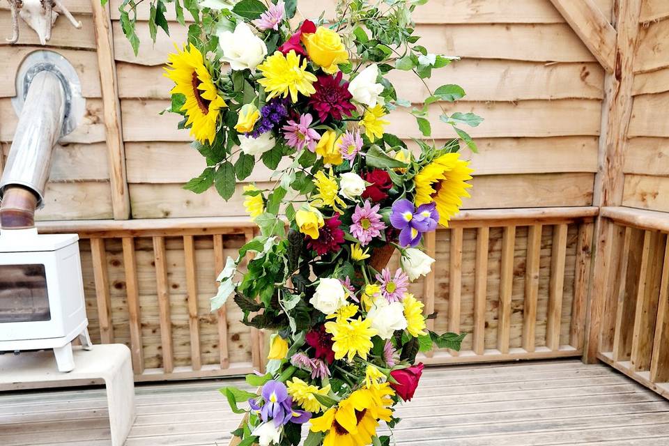 Rustic wedding arch flower arr