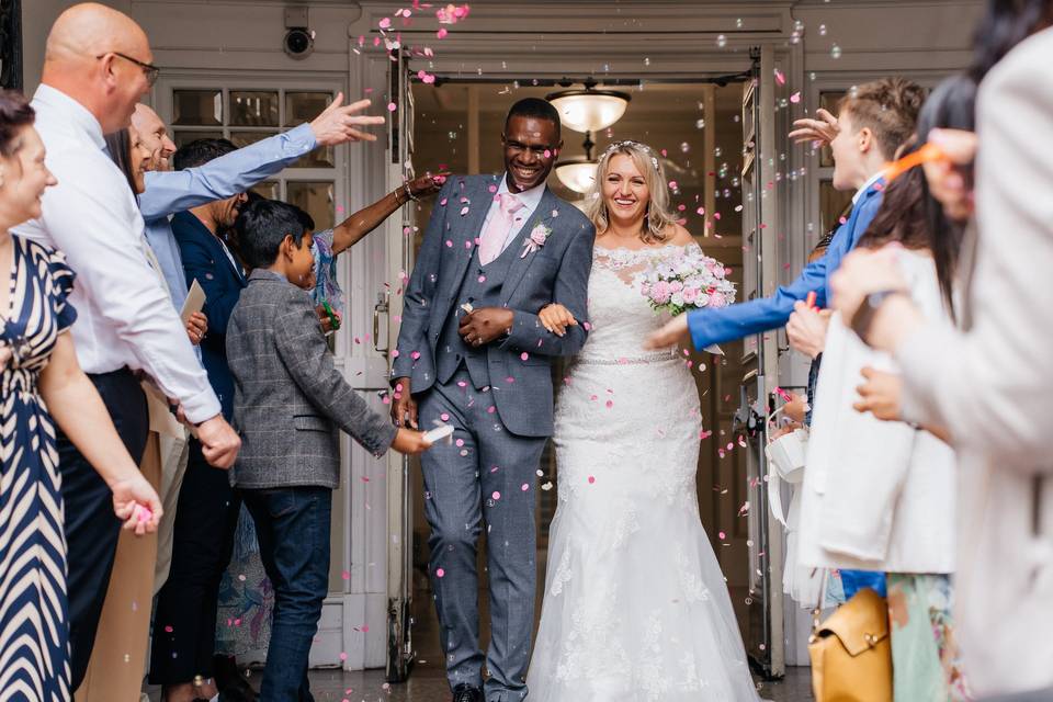 Bride and groom with confetti