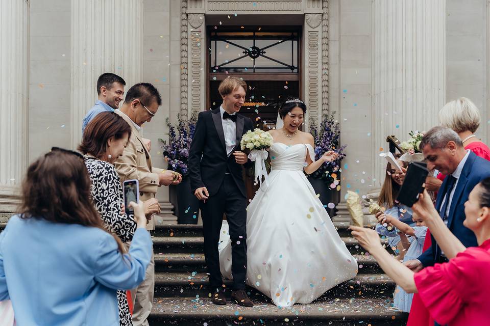 Bride and groom with confetti