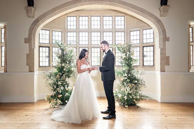 White and green ceremony arch