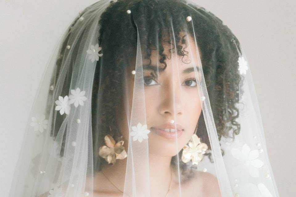 Curly hair and veil