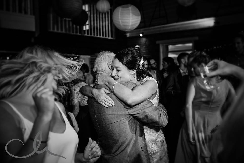 Bride hugs father