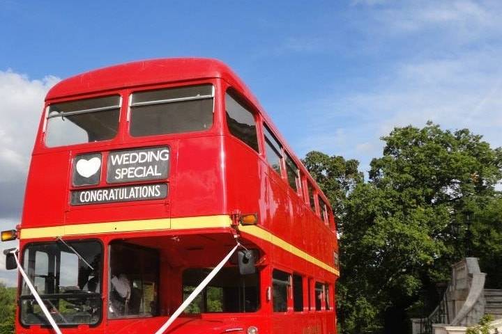 Buses with wedding ribbons