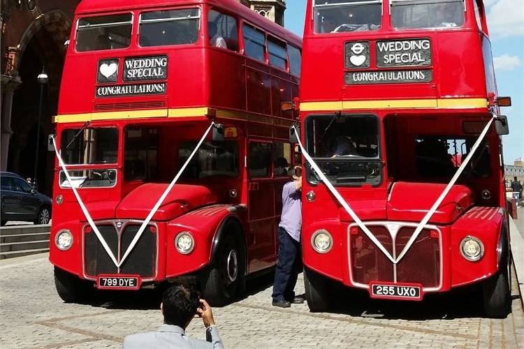 Iconic red bus wedding transport