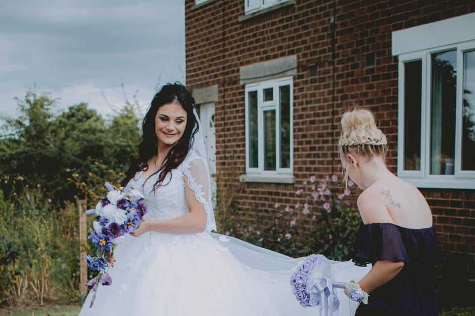 Candid bride and birdesmaid