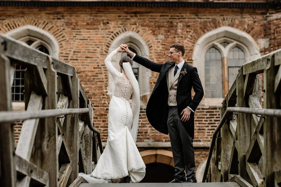 Couple on bridge dancing