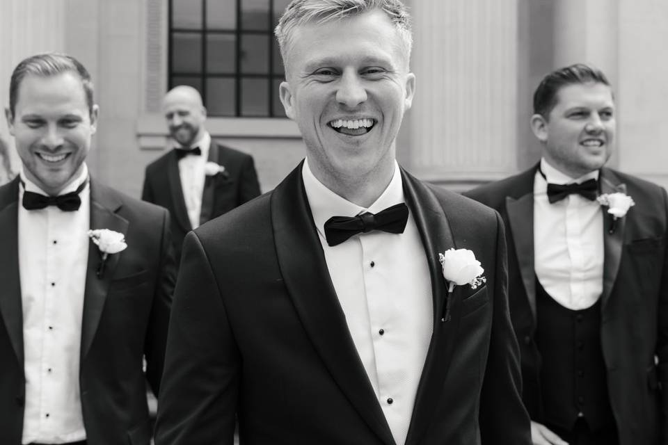 Smiling groomsmen