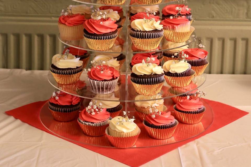 Wedding cake with cupcakes