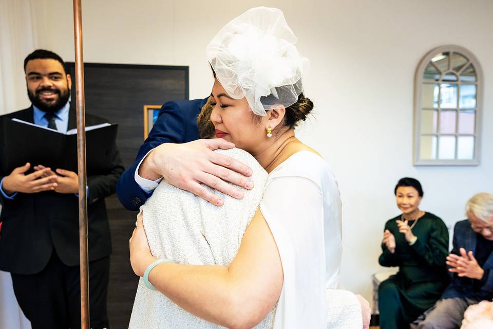 Bride and Groom hugging