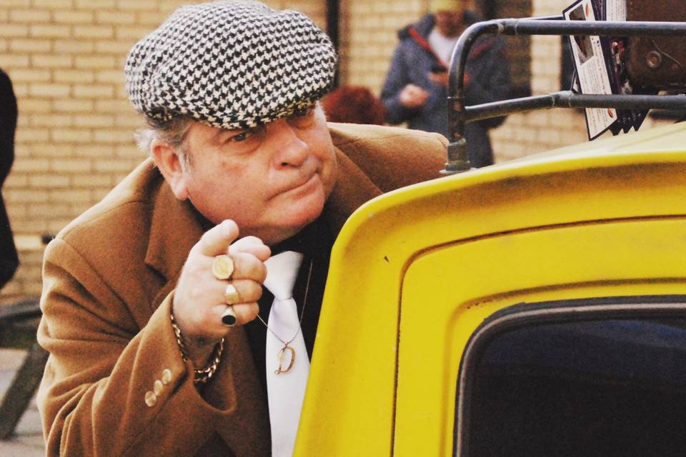 Del Boy lookalike with the v