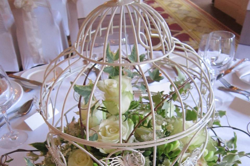 Birdcage with roses and ivy