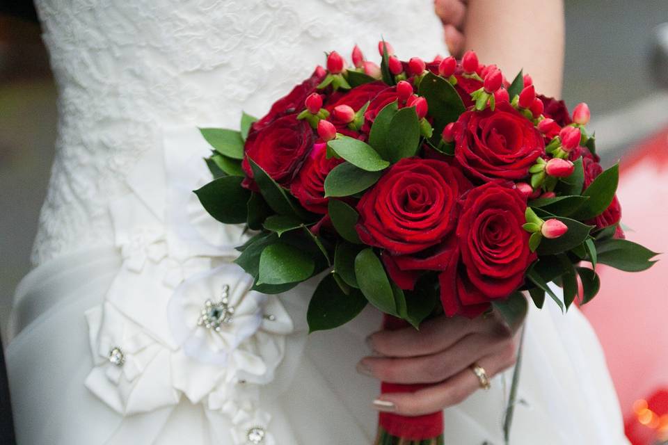Handtied of red roses.