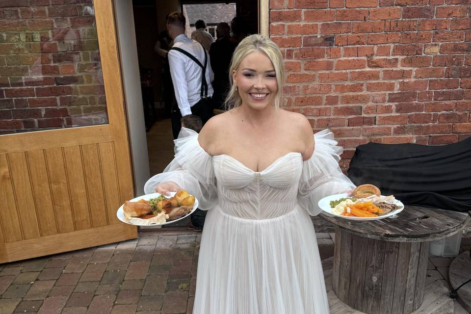 A happy bride with her carvery