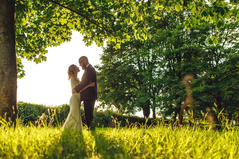 Standing under a tree