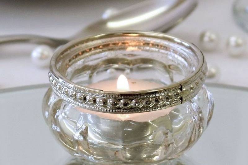 Glass tea light holders