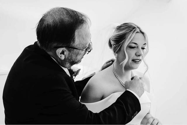 Father helping Bride