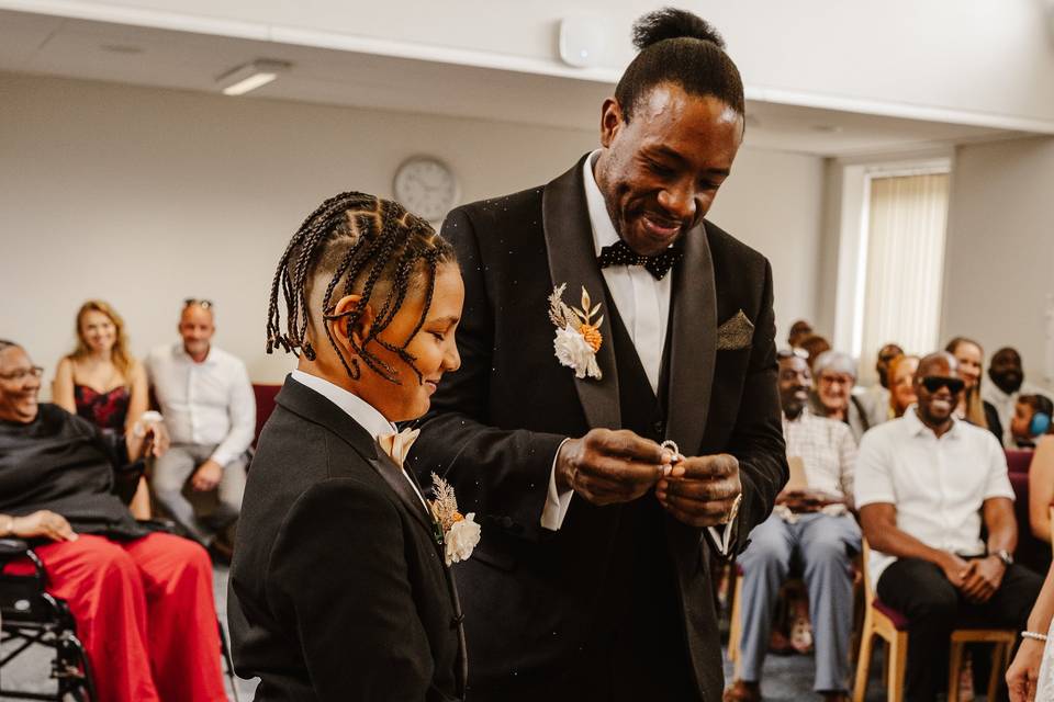 Groom receiving the rings