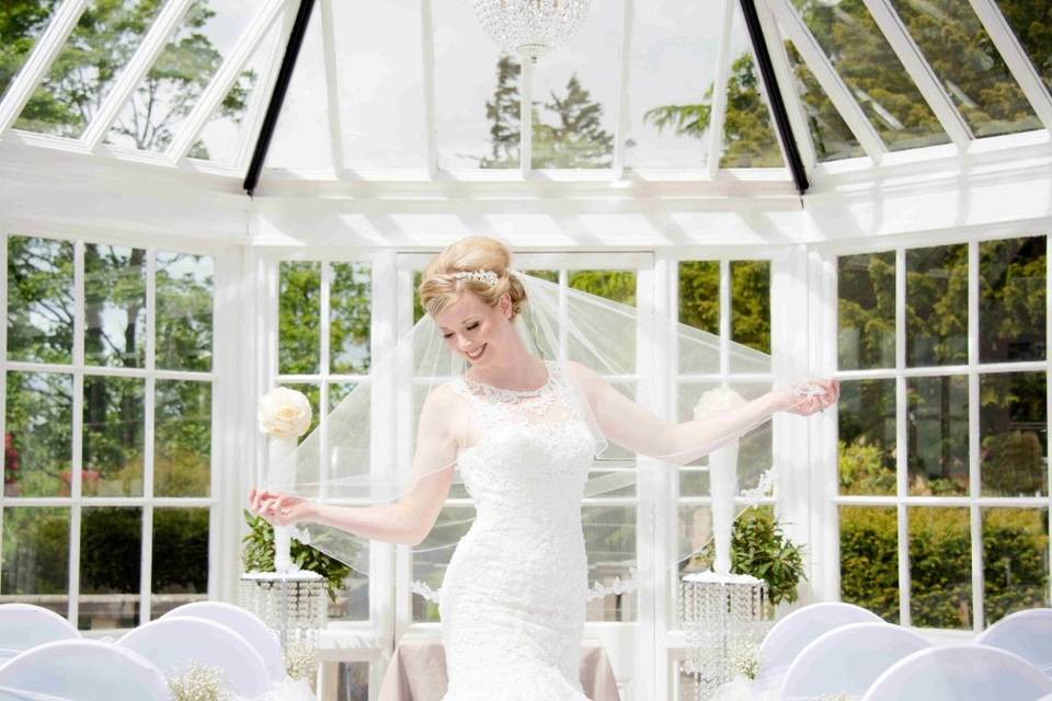 Bride in conservatory