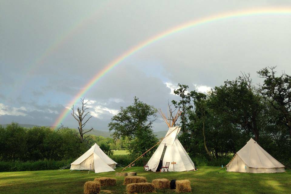 Teepee under rainbows