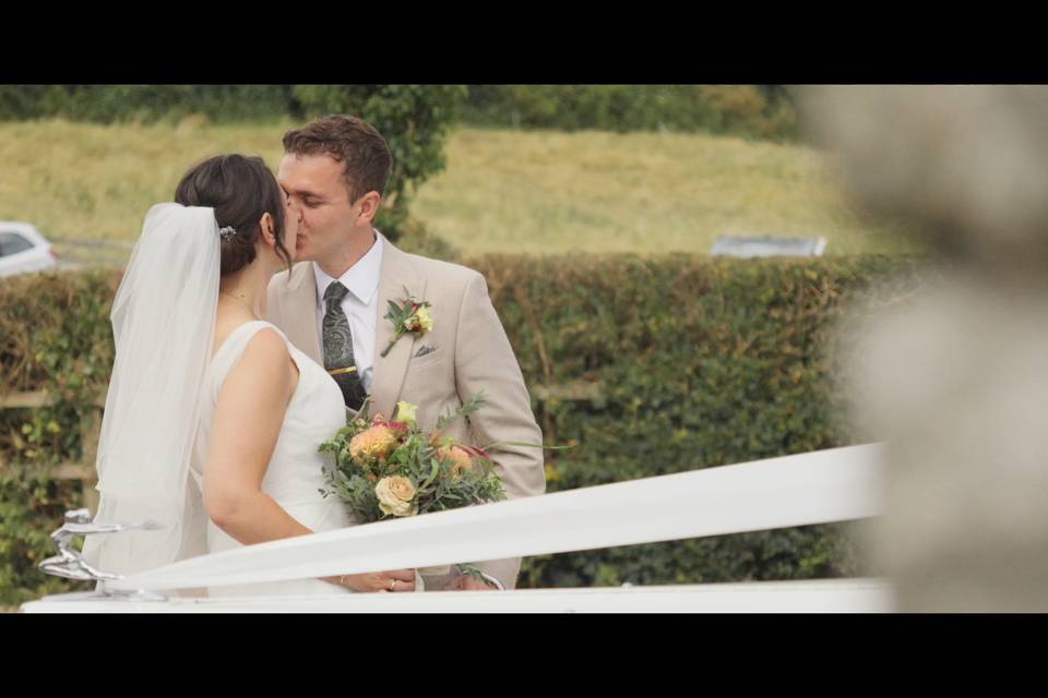 Kiss by the Car