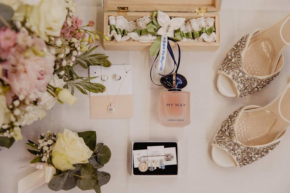 Flat lay with Bridal Charm Pin