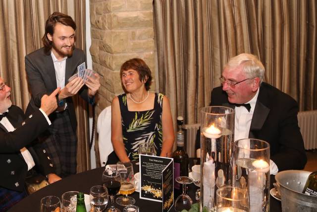 Guests react to magic