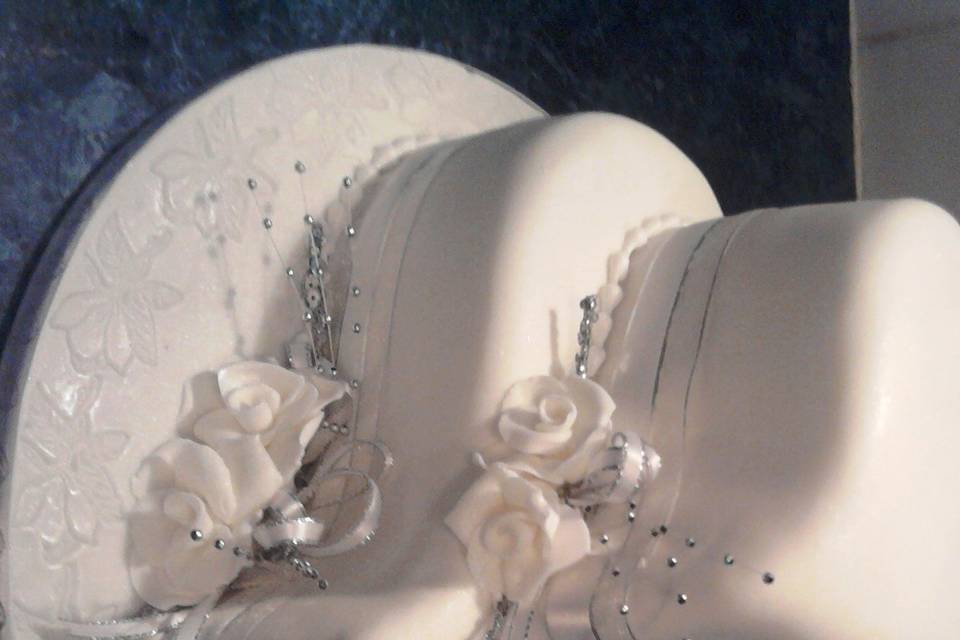 Curved heart wedding cake