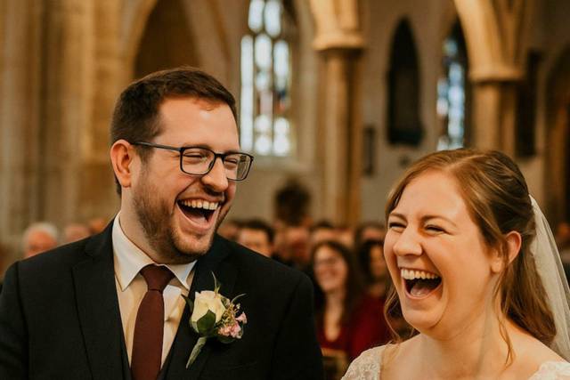 Candid wedding laughter