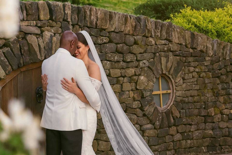 Stone wall couple portrait
