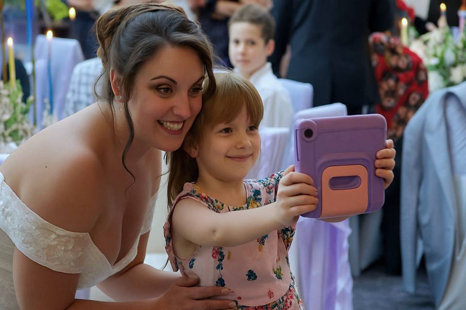 Bride and flower girl selfie