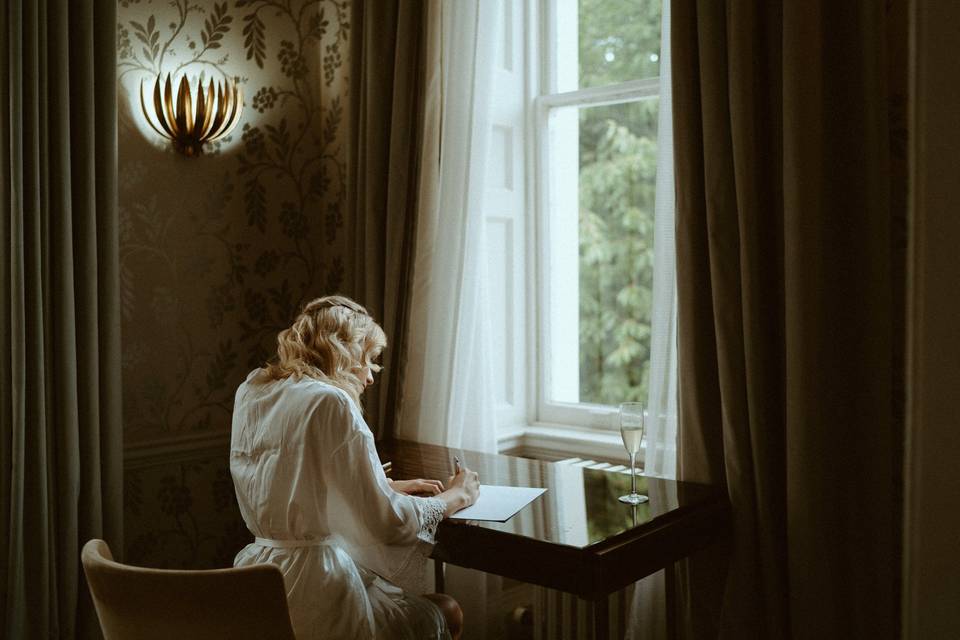 Bride writing her speech