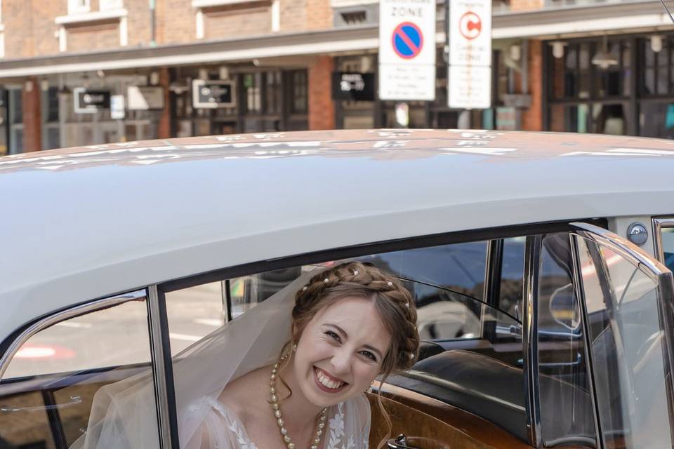 Bride in car