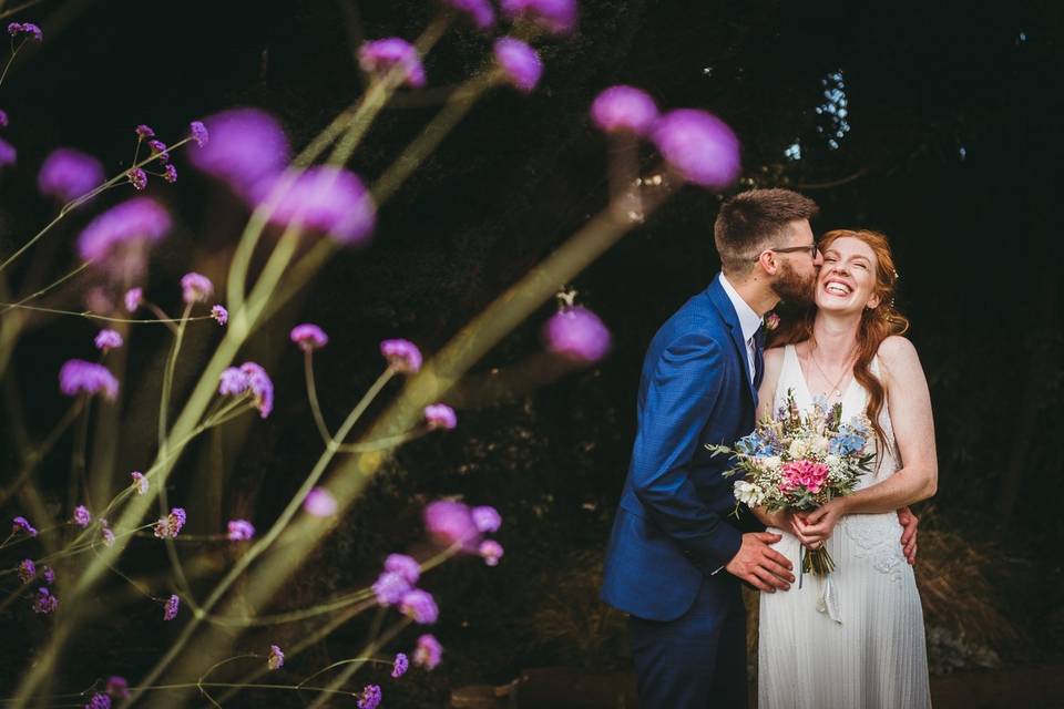 Newlyweds kiss in devon