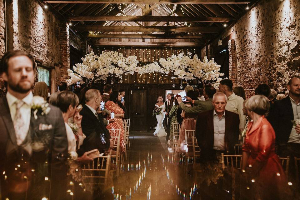 The bride walks down the aisle