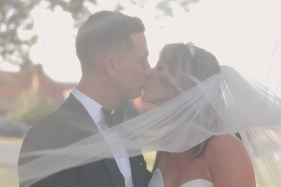 Bride & Groom kissing