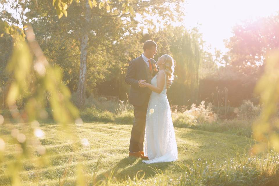 Bride & Groom embracing