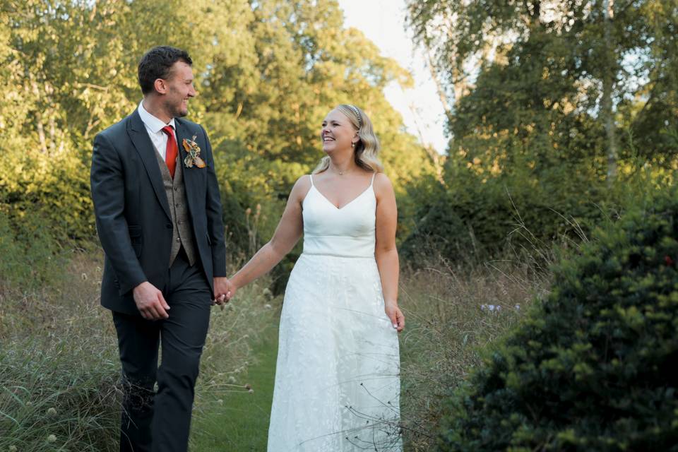 Bride & Groom holding hands