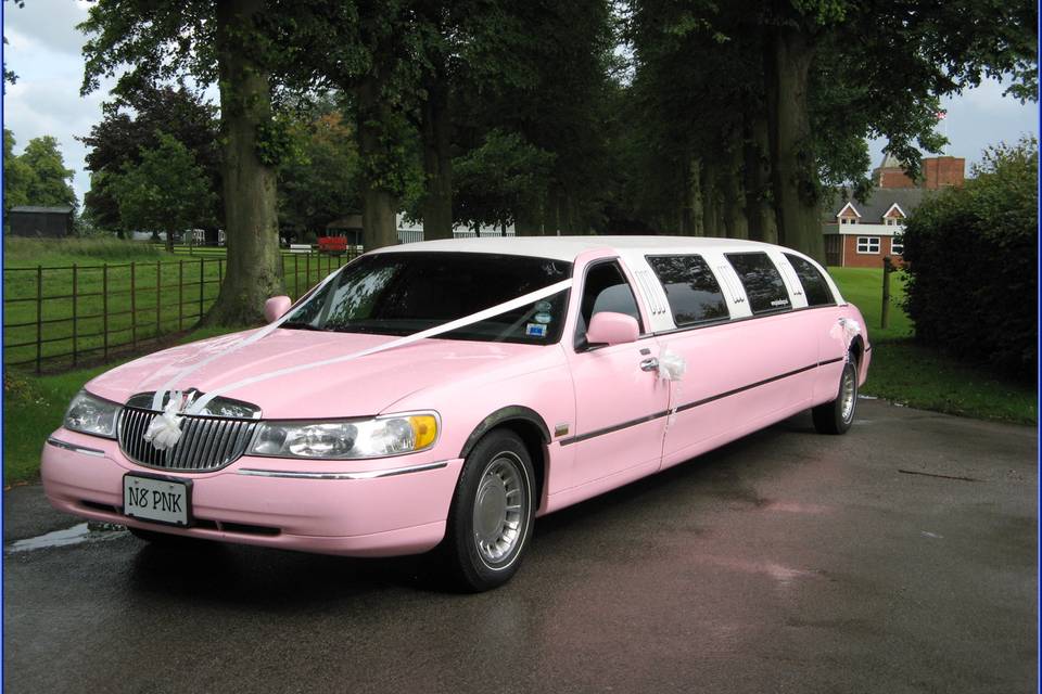 Pink wedding limousine