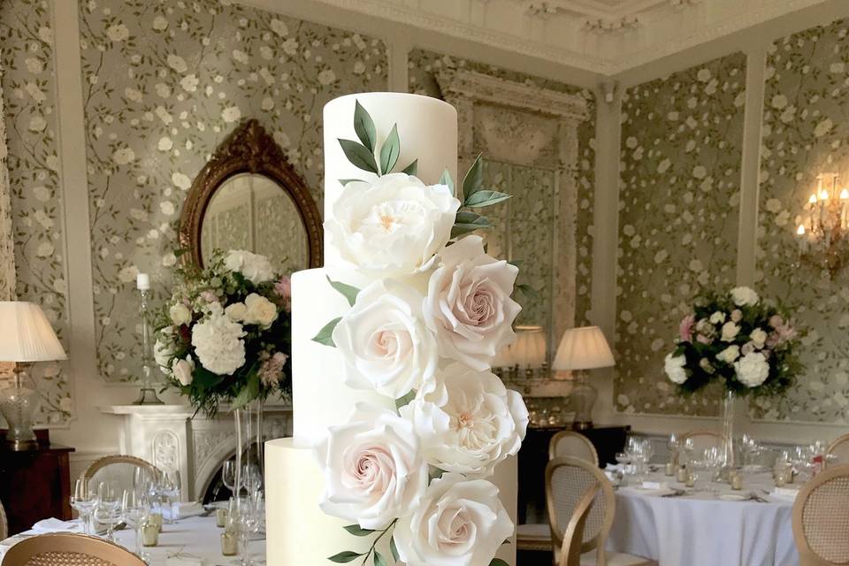 Gold shimmer and blush sugar floral cascade wedding cake