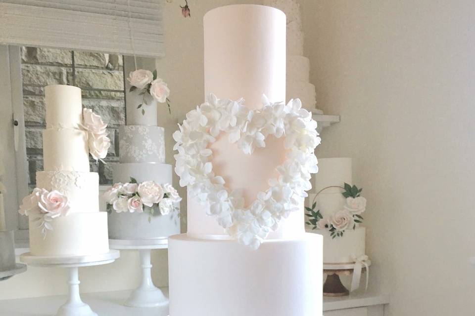 Blush hydrangea heart wedding cake