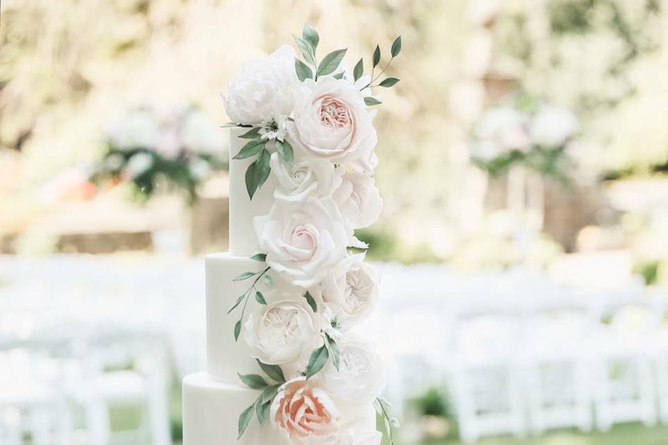 Pastel sugar floral cascade watercolour wedding cake